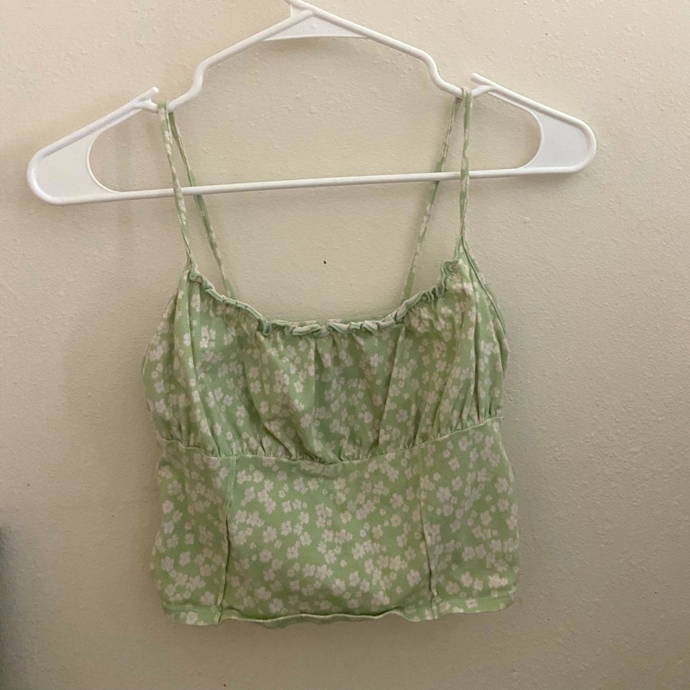 Flower crop top fits perfectly! From Pacsun.